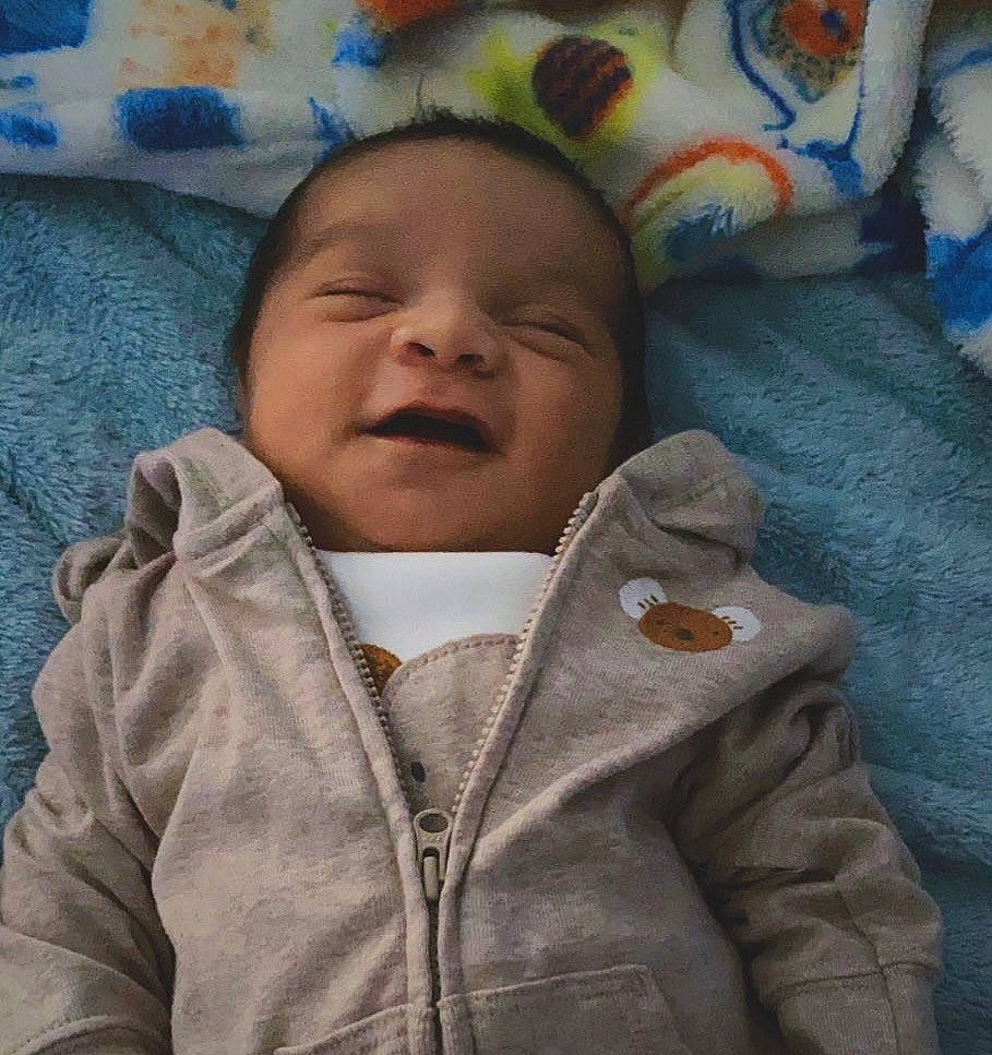 Luka joined the competition — help win amazing prizes! baby, baby_sleeping, baby_toddler_clothing, bedtime, cheek, child, clothing, collar, comfort, cool, happy, linens, mouth, nose, person, skin, sleeve, smile, textile, toddler