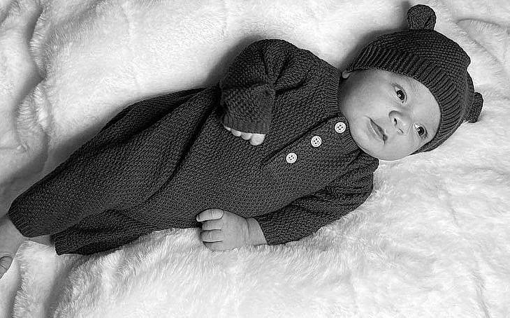 Luka joined the competition — help win amazing prizes! baby, baby_toddler_clothing, beanie, child, comfort, elbow, gesture, grey, happy, headwear, monochrome, monochrome_photography, pattern, person, portrait_photography, sitting, sleeve, smile, snow, stock_photography