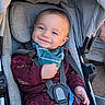 baby, infant, child, smiling, stroller, portrait, outdoor, harness, seated, clothing, jacket, bib, canopy, face, eyes, hands, happy, closeup, daylight,  안전