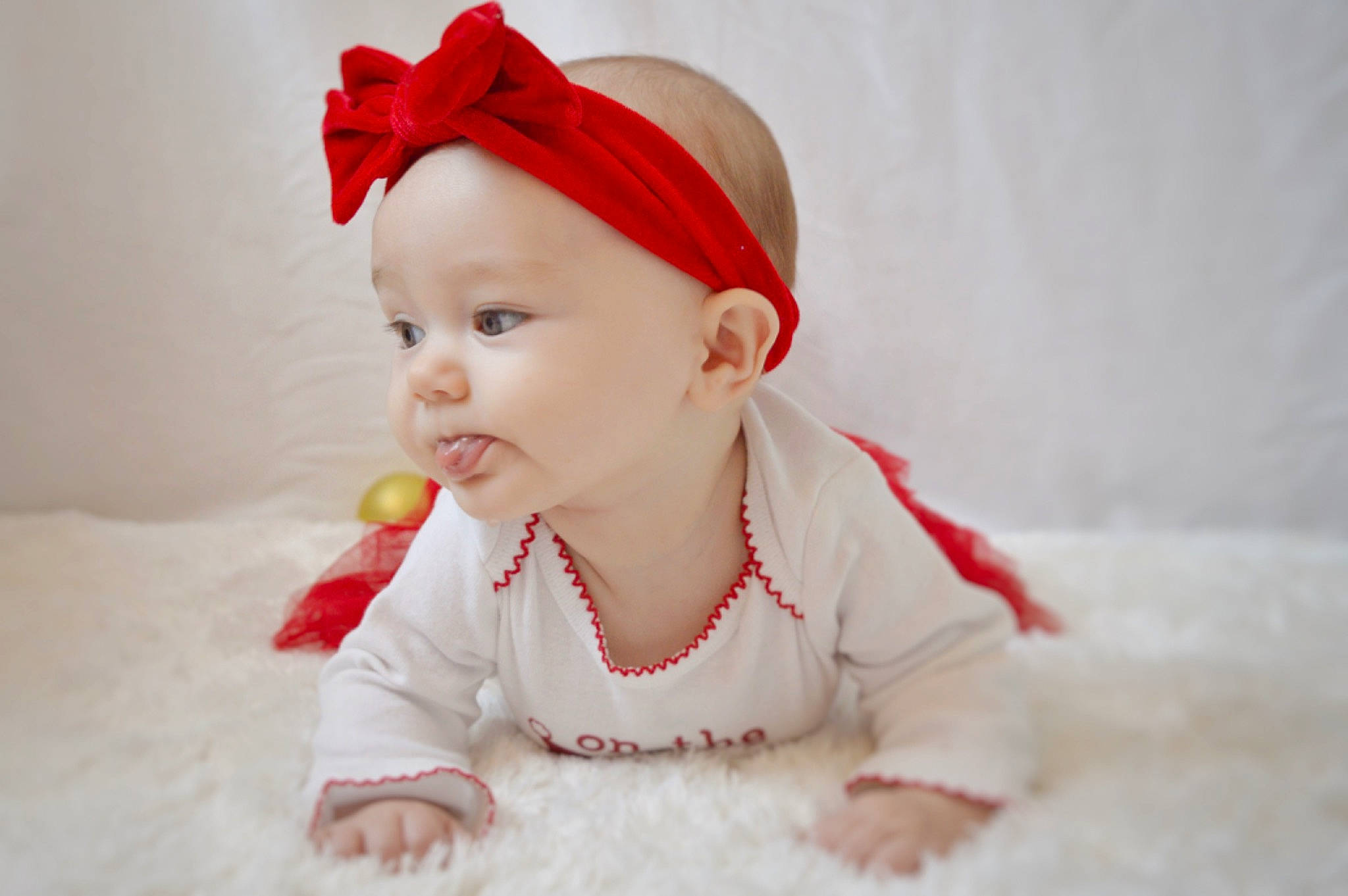 Blakelyn is registered to the contest to win money with this photo: baby, cheek, child, costume, costume_accessory, ear, fashion_accessory, hair_accessory, head, headband, headgear, headpiece, lip, person, portrait_photography, red, skin, toddler