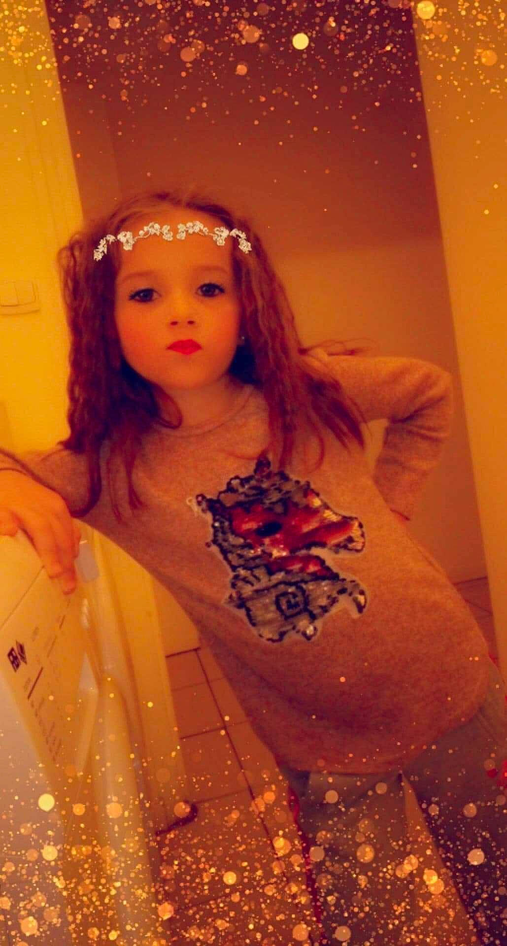 Louane a rejoint le concours — aidez-le/la à gagner de superbes lots ! beauty, brown_hair, child, child_model, doll, dress, fawn, hair_accessory, headpiece, lip, long_hair, peach, person, photography, toy