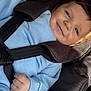 Luca is registered to the contest to win money with this photo: baby, child, car_seat, blue_clothing, smile, happy, infant, seatbelt, safety, airbag_warning, cute, face, young_child, portrait, straps, baby_hand, closeup, indoors, child_seat, protective
