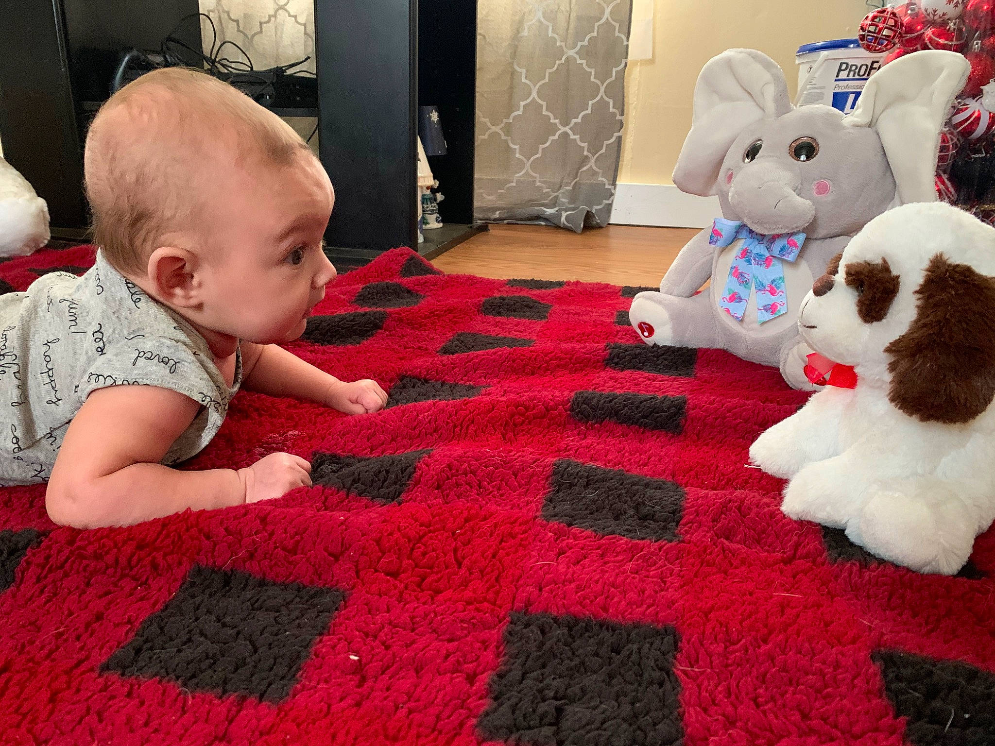 Kalanii is registered to the contest to win money with this photo: art, baby, baby_toys, blanket, carpet, child, crochet, floor, flooring, fur, interior_design, living_room, person, play, plush, room, stuffed_toy, textile, toddler, toy