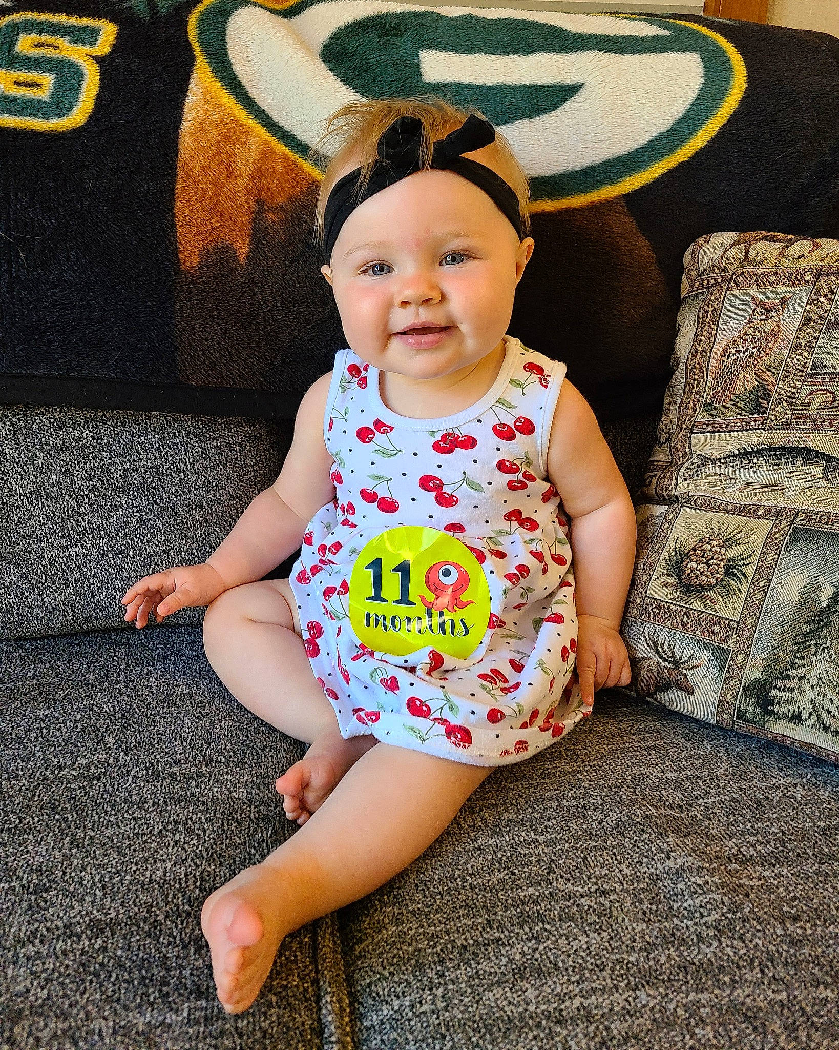 Lucille joined the competition — help win amazing prizes! baby, baby_toddler_clothing, child, cool, ear, fawn, fun, happy, hat, head, headgear, headwear, joy, leg, pattern, person, play, sitting, smile, t_shirt