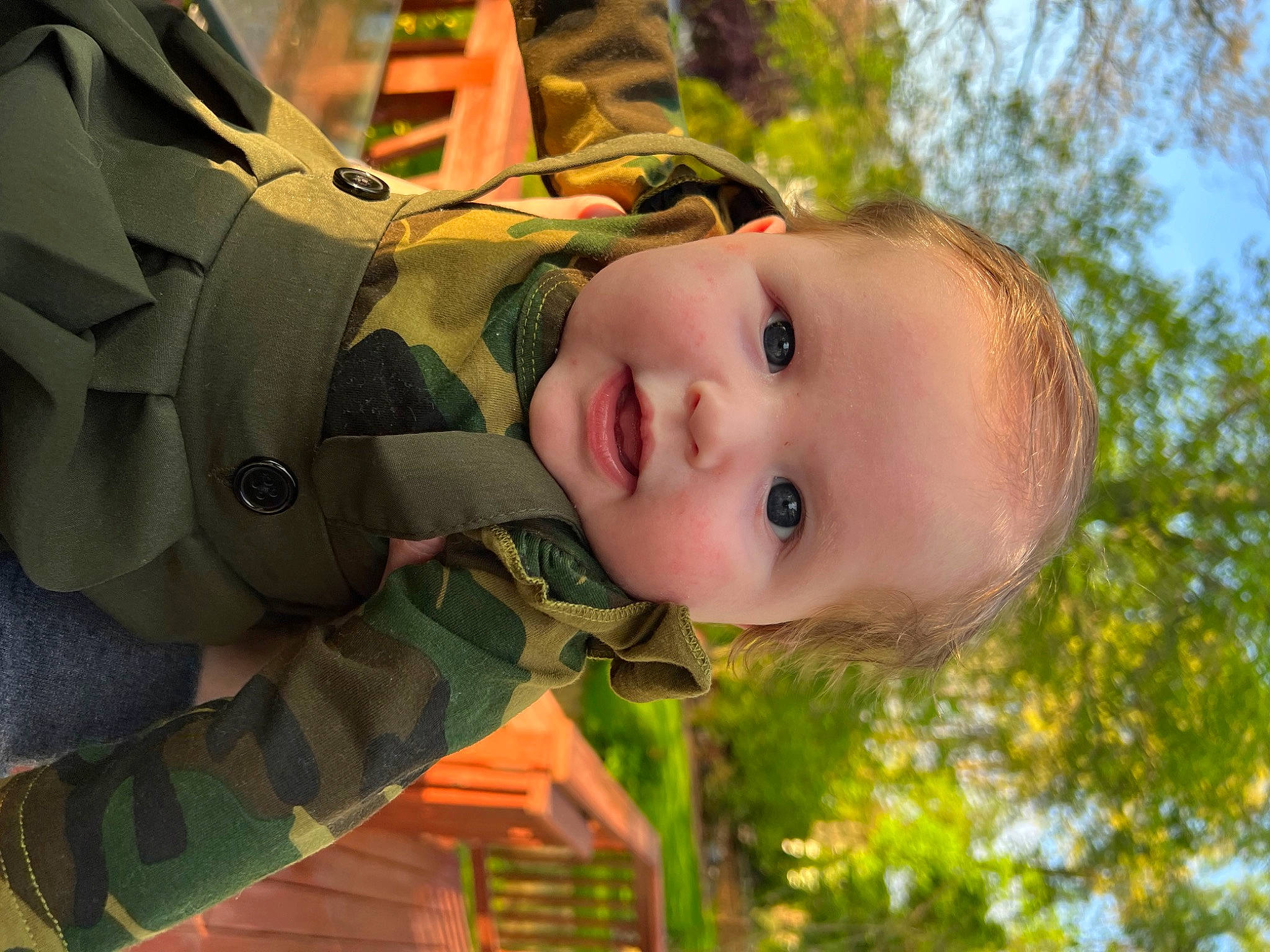 Reese joined the competition — help win amazing prizes! baby, child, eye, fun, grass, happy, hat, head, house, leisure, outerwear, people_in_nature, person, plant, skin, sky, smile, toddler, tree, window