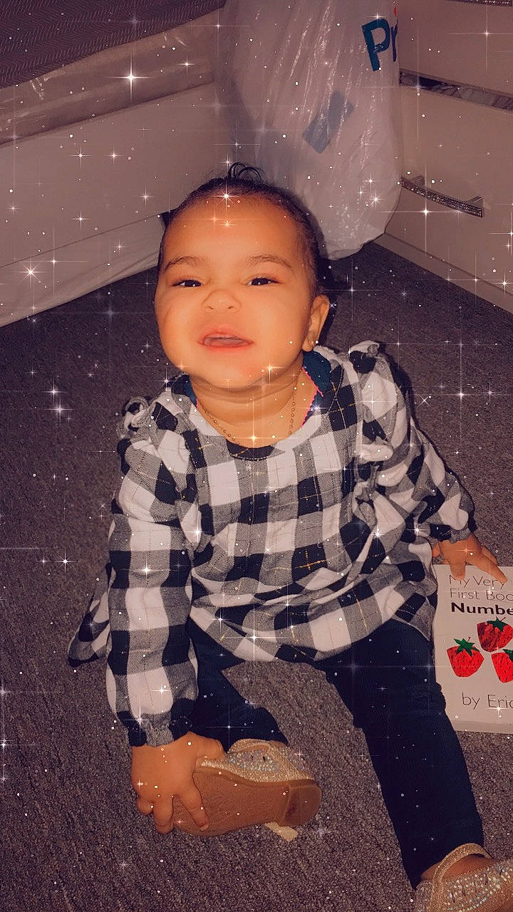 Melani joined the competition — help win amazing prizes! baby, cheek, child, face, fun, head, person, play, smile, standing, toddler