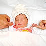 Alice joined the competition — help win amazing prizes! newborn, baby, sleeping, hands, adult_hands, pinky_promise, white_blanket, towel_turban, infant, bed, peaceful, cute, skin, portrait, closeup, resting, family, love, care, toddler