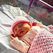 Aleyah joined the competition — help win amazing prizes! newborn, baby, sleeping, pink_hat, pink_blanket, hospital_bassinet, infant, knitwear, cozy, peaceful, cute, child, portrait, resting, soft_light, indoors, small_hands, blanket, sleep, baby_clothes