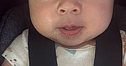 Liam Paredes joined the competition — help win amazing prizes! baby, child, infant, car_seat, seatbelt, strapped_in, wide_eyed, facial_expression, drool, portrait, close_up, indoors, vehicle, clothing, onesie, animal_print, sitting, face, eyes, safe