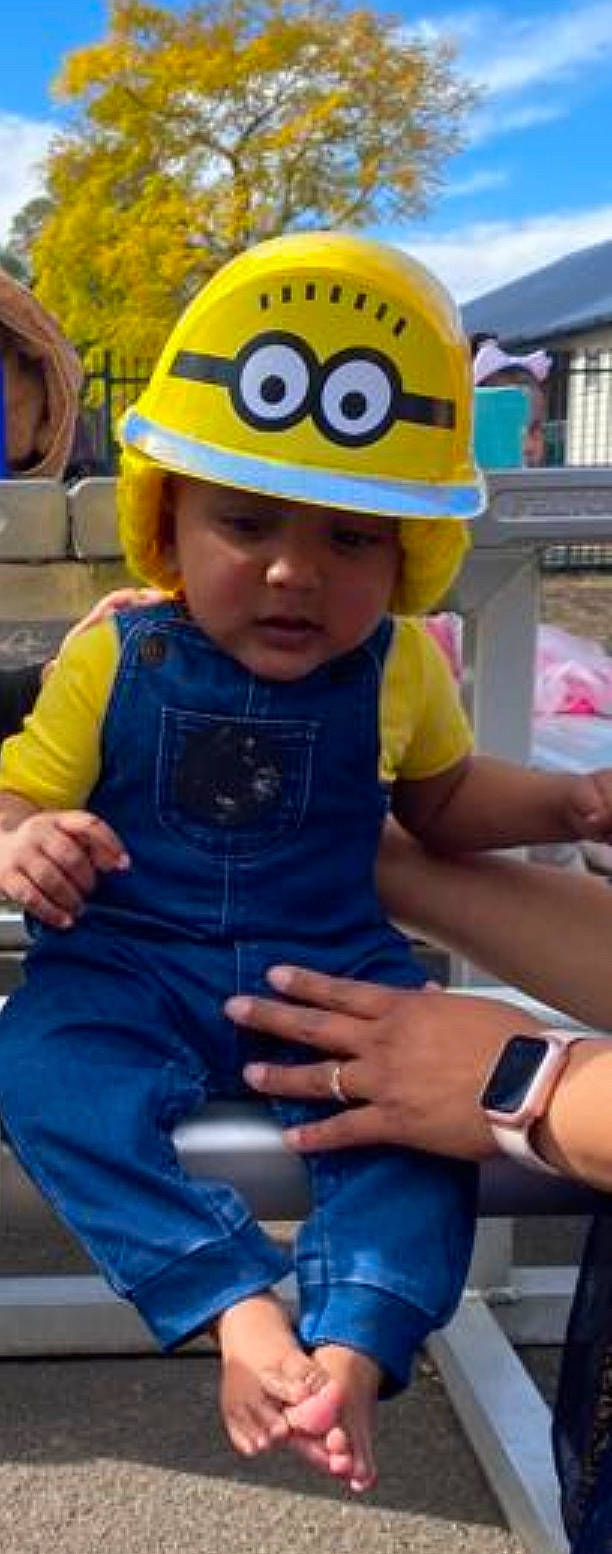Ryan is registered to the contest to win money with this photo: baby_toddler_clothing, child, finger, fun, goggles, hand, hard_hat, hat, headgear, headwear, helmet, leisure, person, personal_protective_equipment, photograph, plant, recreation, snapshot, sunglasses, toddler