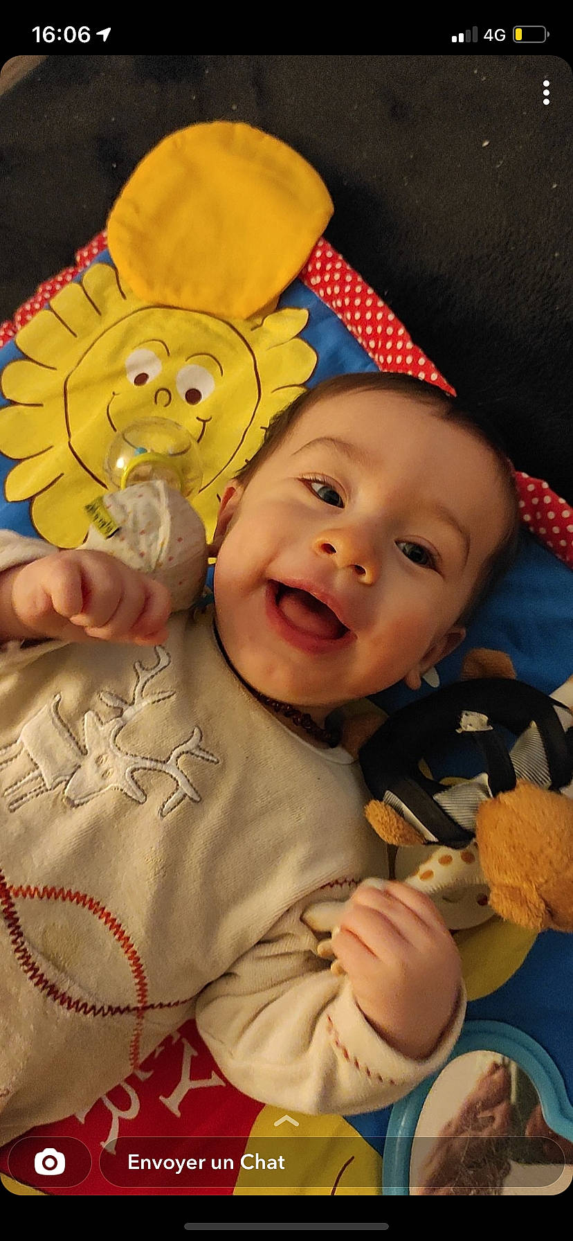 Angelo participe au concours pour gagner de l'argent avec cette photo : baby, baby_toddler_clothing, cheek, eye, face, facial_expression, finger, gesture, happy, head, leaf, mouth, nose, orange, organ, person, product, skin, smile, textile