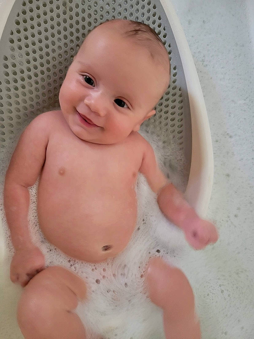 Everest joined the competition — help win amazing prizes! baby, baby_bathing, baby_products, bathing, bathtub, cheek, chest, child, eyebrow, finger, iris, joy, liquid, organ, person, pink, skin, smile, stomach, thumb
