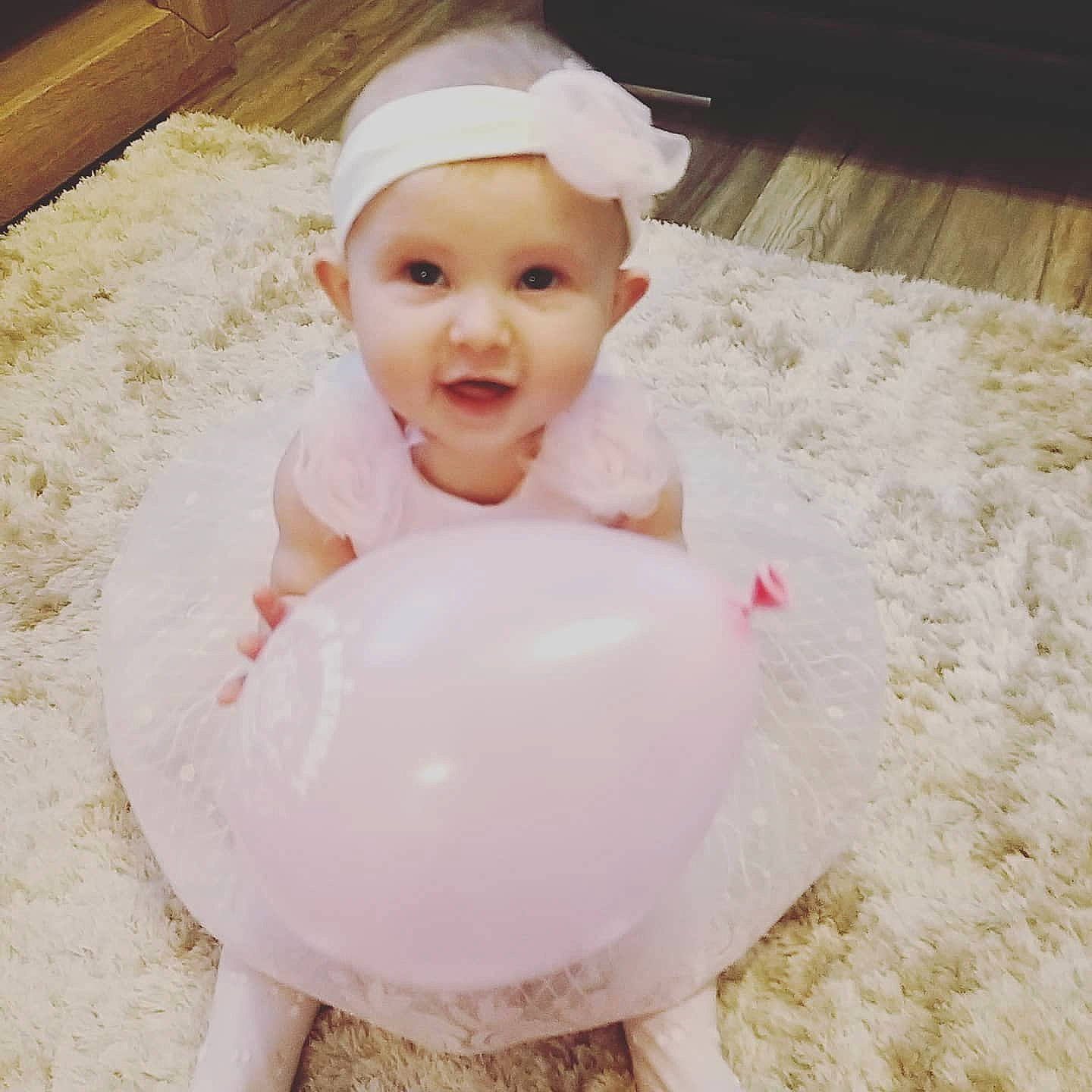 Ayda is registered to the contest to win money with this photo: baby, baby_toddler_clothing, bathing, beauty, child, dress, face, foam, hair_accessory, happy, head, headwear, person, pink, play, product, skin, smile, toddler