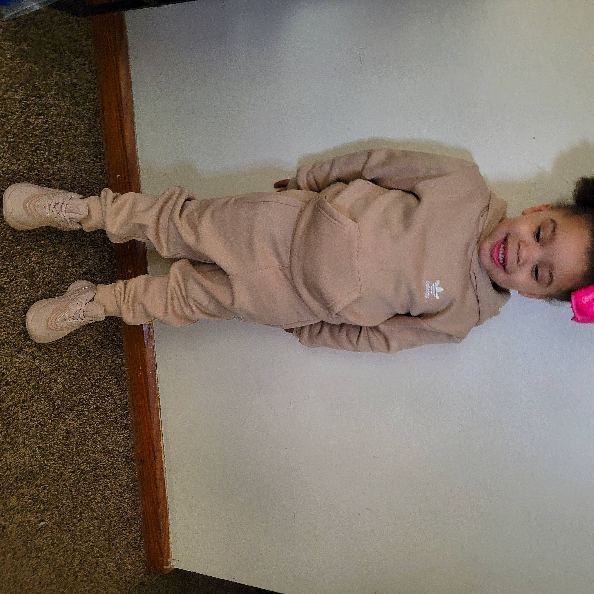 Azaria joined the competition — help win amazing prizes! comfort, elbow, flooring, fur, hardwood, human_leg, joy, knee, leg, linens, outdoor_shoe, person, room, sitting, sleeve, walking_shoe, wood, wrist