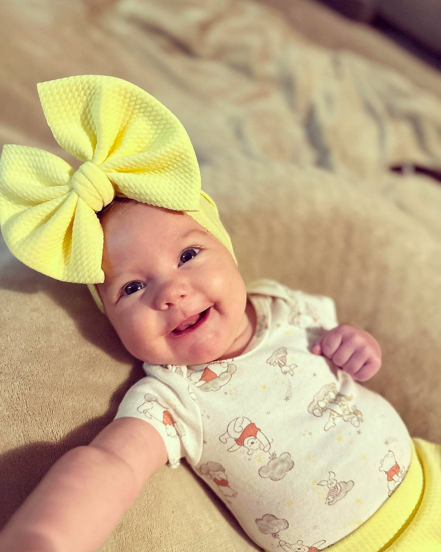 Lacie is registered to the contest to win money with this photo: baby, baby_sleeping, baby_toddler_clothing, cap, clothing, comfort, costume_hat, eye, face, fashion_accessory, happy, hat, head, headgear, headwear, joy, person, sitting, skin, sleeve