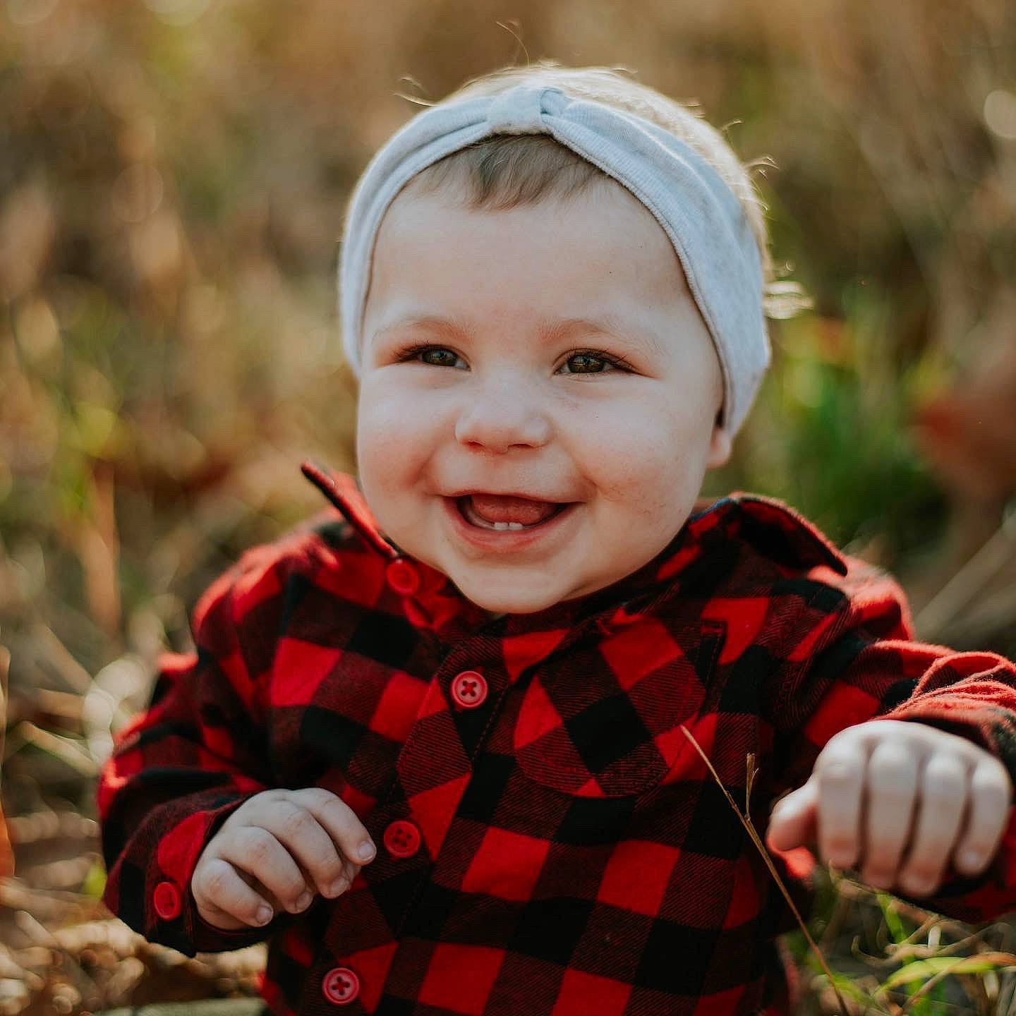 Lexington joined the competition — help win amazing prizes! baby_toddler_clothing, collar, flash_photography, grass, happy, human_body, iris, joy, lip, outerwear, people_in_nature, person, plaid, plant, skin, sleeve, smile, standing, tartan, textile