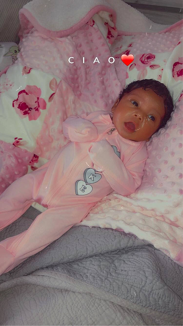 Kahlani is registered to the contest to win money with this photo: baby, baby_products, baby_safety, baby_sleeping, baby_toddler_clothing, bedding, bedtime, cheek, child, comfort, happy, linens, magenta, pattern, peach, person, pink, room, skin, sleeve