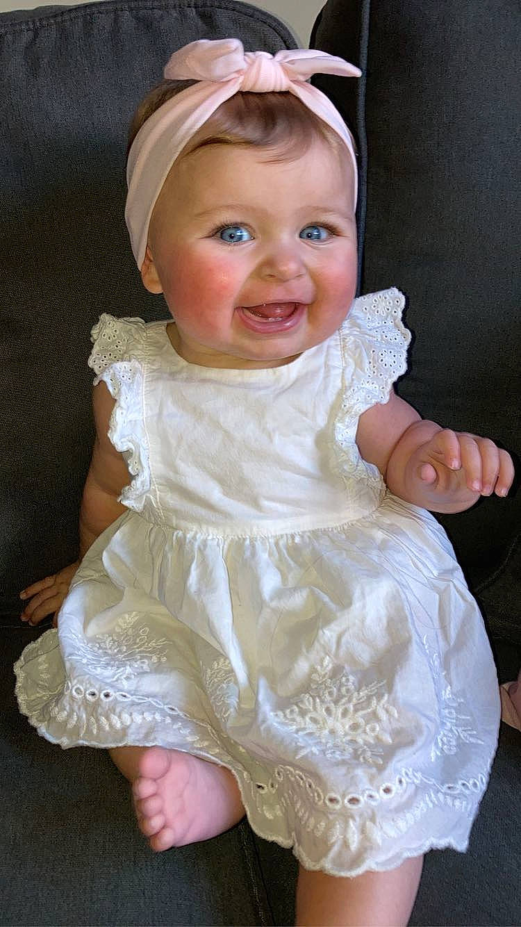 Alora joined the competition — help win amazing prizes! baby, baby_toddler_clothing, chin, day_dress, dress, embellishment, eye, facial_expression, hairstyle, happy, head, iris, joy, one_piece_garment, outerwear, person, photograph, pink, skin, sleeve