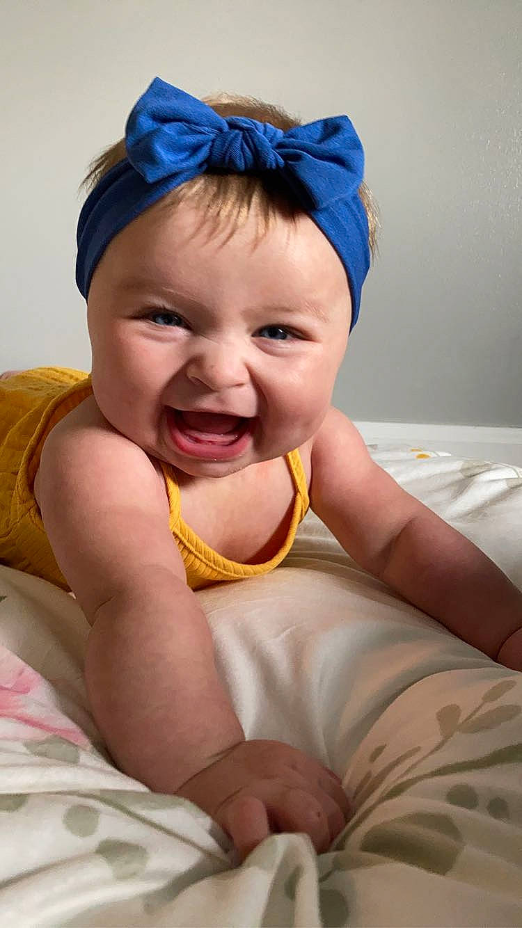 Alora joined the competition — help win amazing prizes! baby, baby_toddler_clothing, blue, child, chin, comfort, eyelash, fashion_accessory, finger, fun, gesture, happy, lip, mouth, neck, person, pink, skin, smile, toddler