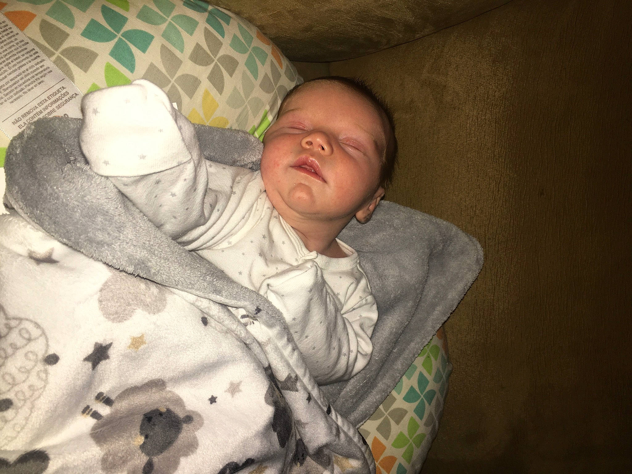 Gabriel is registered to the contest to win money with this photo: baby, baby_products, baby_sleeping, bed, bedding, bedtime, child, comfort, infant_bed, linens, nap, nose, pattern, person, pillow, room, sitting, skin, sleep, sun_hat