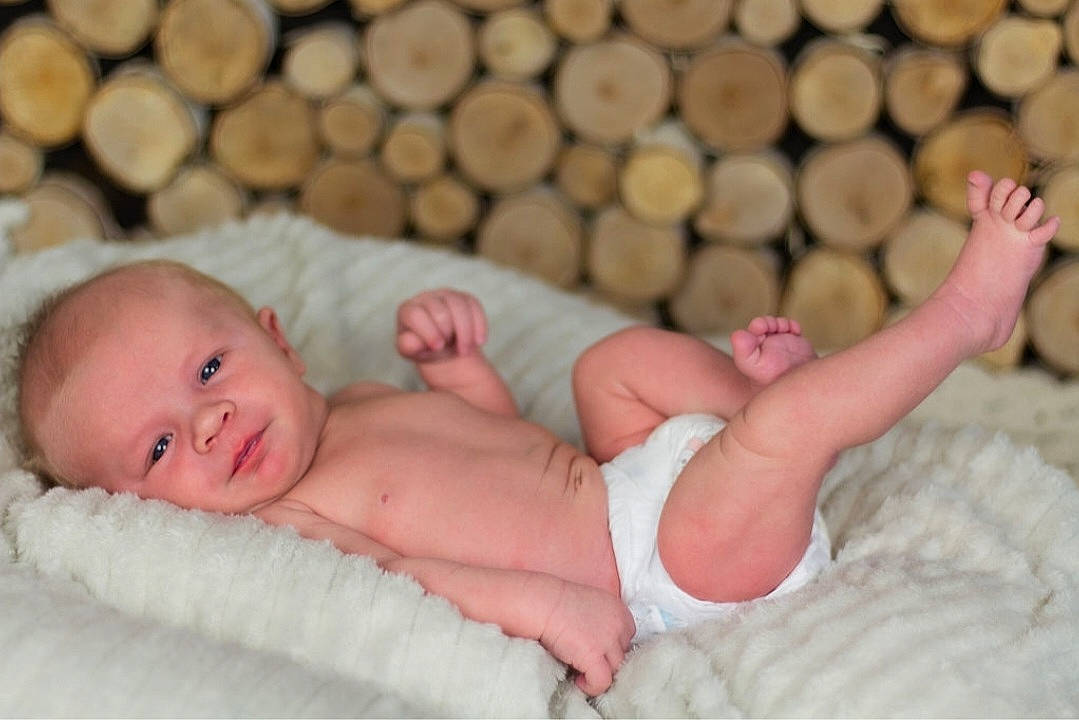 Bowen joined the competition — help win amazing prizes! baby, baby_toddler_clothing, beauty, cheek, child, close_up, comfort, facial_expression, finger, flooring, foot, human_leg, mammal, pattern, person, pink, product, skin, textile, toddler