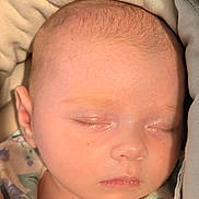 Gabrielle participe au concours pour gagner de l'argent avec cette photo : baby, sleeping, face, blanket, bib, soft, closeup, infant, peaceful, child, newborn, skin, head, clothing, portrait, cute, rest, indoor, babywear, young