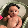 baby, bathtub, water, child, skin, toy, green, pink, black_cloth, bath, infant, bathroom, water_droplets, cute, portrait, sitting, play, small, indoors, relaxing