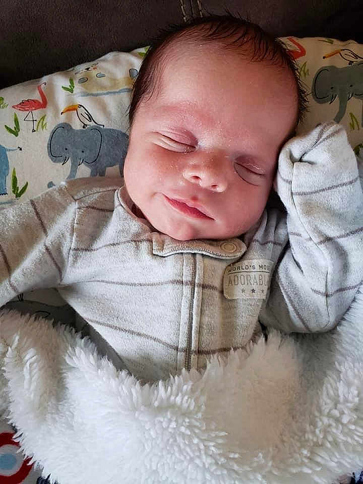 Cameron is registered to the contest to win money with this photo: baby, baby_sleeping, blanket, cheek, child, face, head, lip, mouth, nap, nose, skin, sleep, smile, toddler