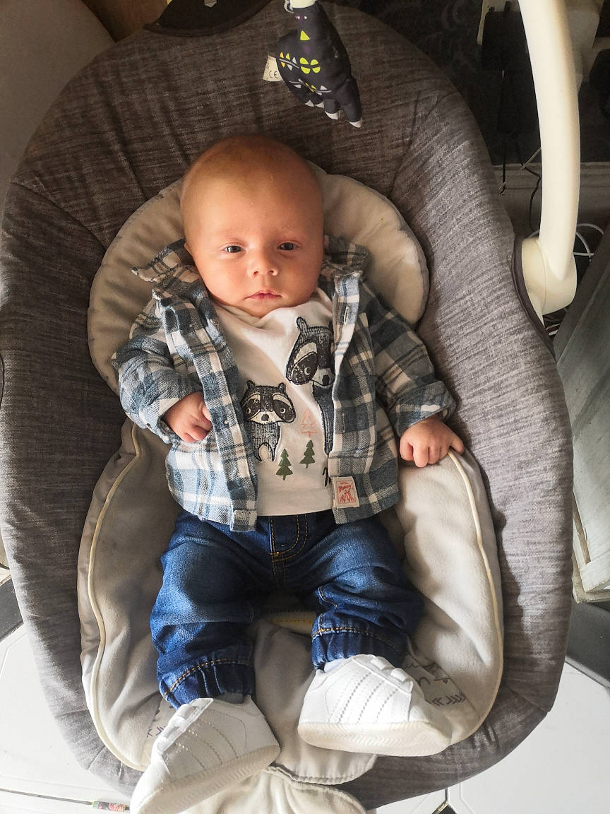 John joined the competition — help win amazing prizes! baby, baby_carriage, baby_in_car_seat, baby_products, car_seat, cheek, child, comfort, person, product, sitting, skin, toddler