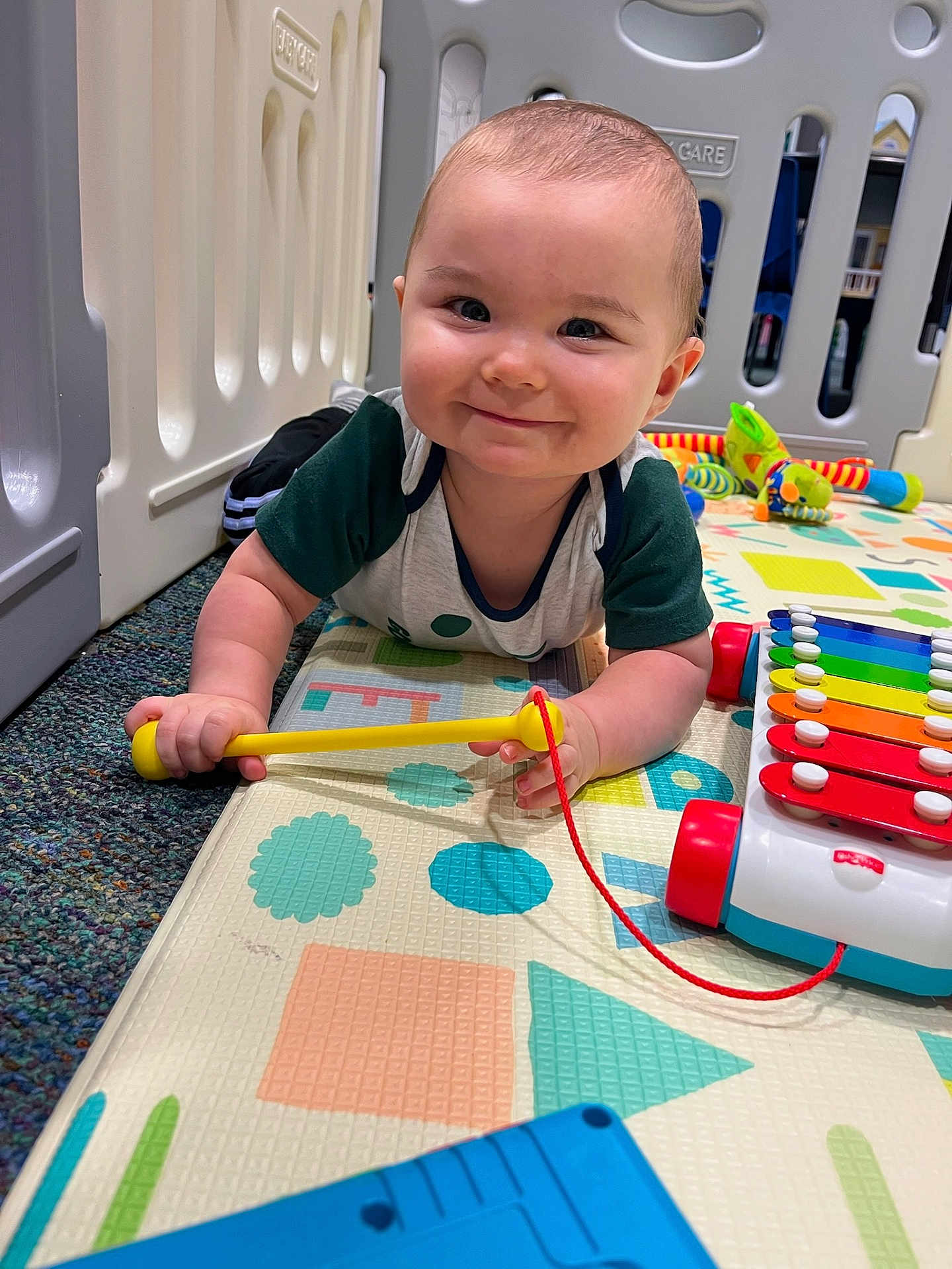 John joined the competition — help win amazing prizes! baby, child, smile, toy, playmat, xylophone, playpen, indoor, crawling, colorful, mallet, happy, infant, floor, carpet, cute, person, young, play, fun