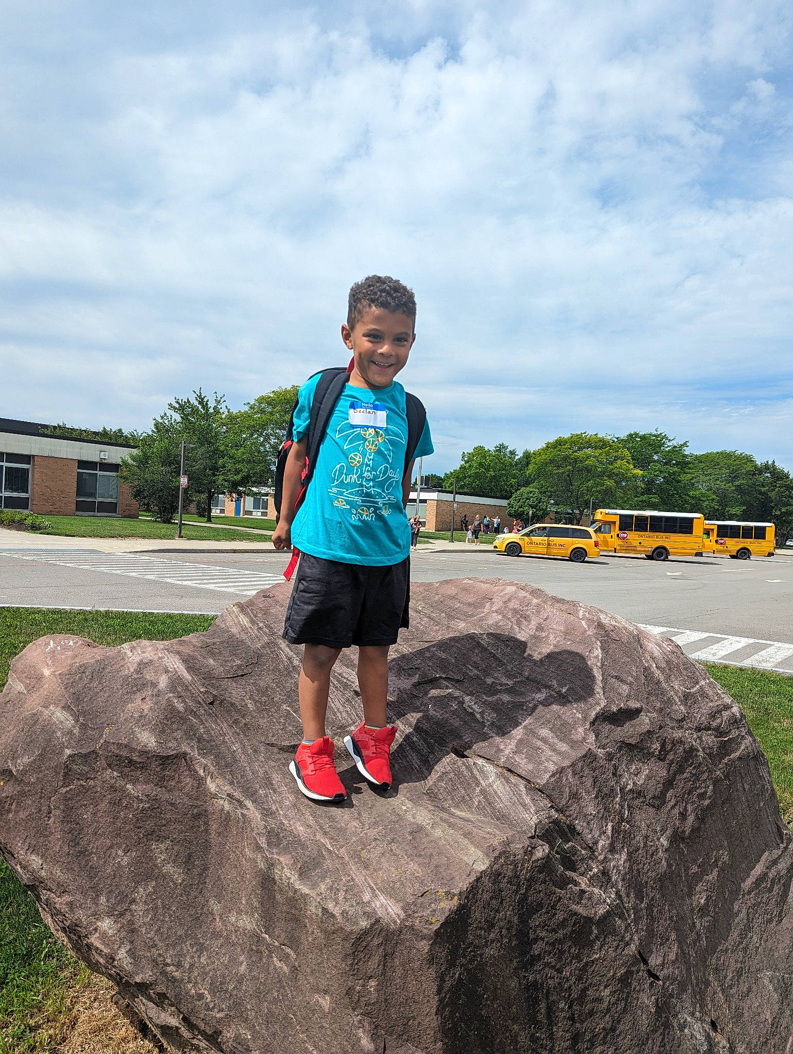 Declan joined the competition — help win amazing prizes! asphalt, child, city, cloud, fun, grass, grassland, happy, horizon, joy, landscape, leisure, person, plant, recreation, shorts, sky, soil, t_shirt, toddler