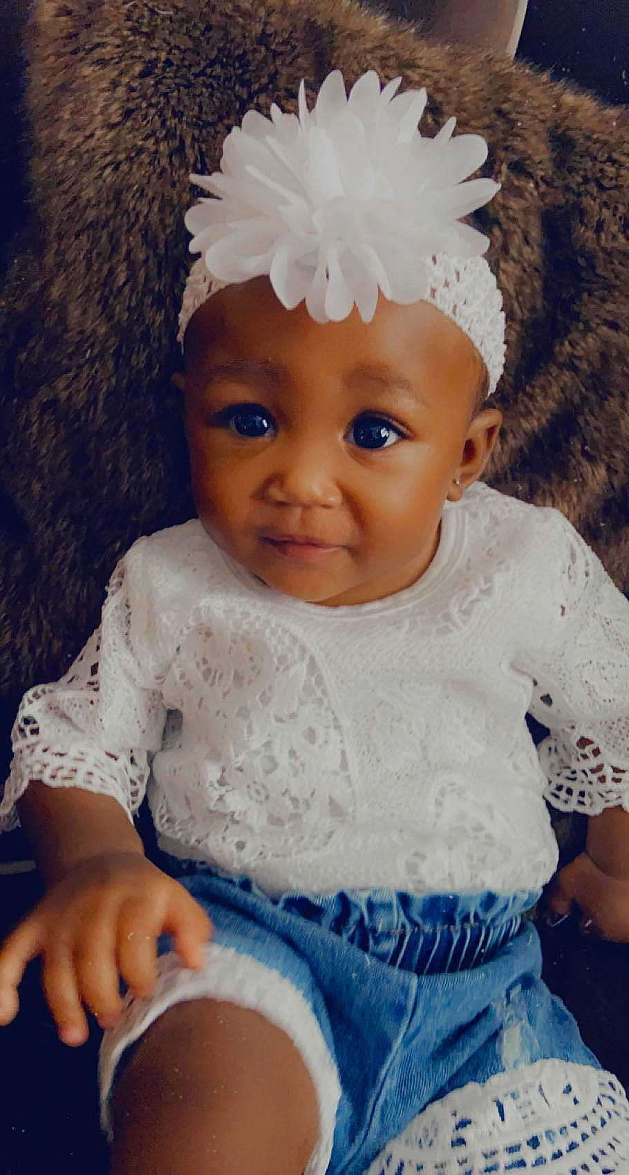 Anaiyah is registered to the contest to win money with this photo: arm, azure, blue, cap, cheek, chin, clothing, eye, eyebrow, facial_expression, hairstyle, head, human_body, iris, lip, nose, organ, person, skin, textile