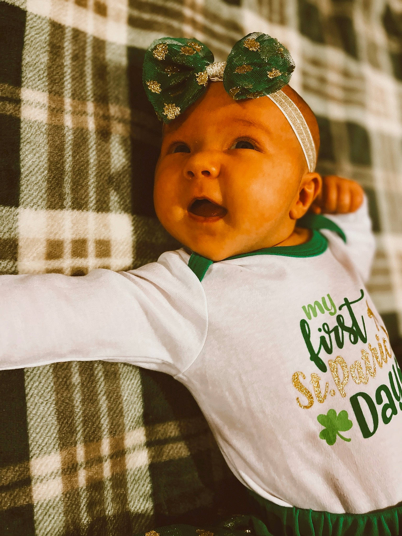 Rosalie is registered to the contest to win money with this photo: baby, baby_toddler_clothing, baseball_cap, beanie, cap, child, eye, fashion_accessory, fun, happy, headgear, linens, pattern, person, personal_protective_equipment, plaid, sleeve, t_shirt, tartan, toddler