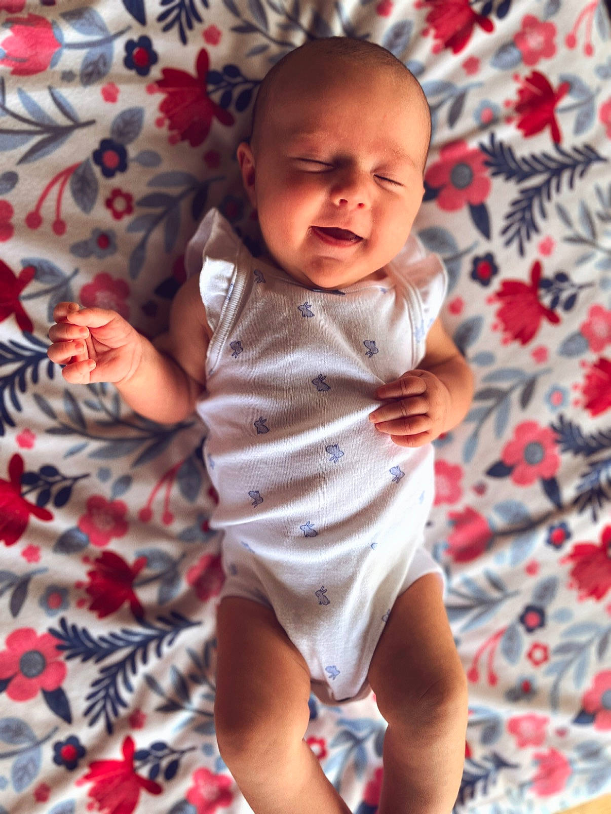 Rosalie is registered to the contest to win money with this photo: baby, baby_toddler_clothing, cheek, eye, face, finger, hand, happy, head, human_body, infant_bodysuit, leg, lip, mouth, person, pink, skin, sleeve, t_shirt, thigh