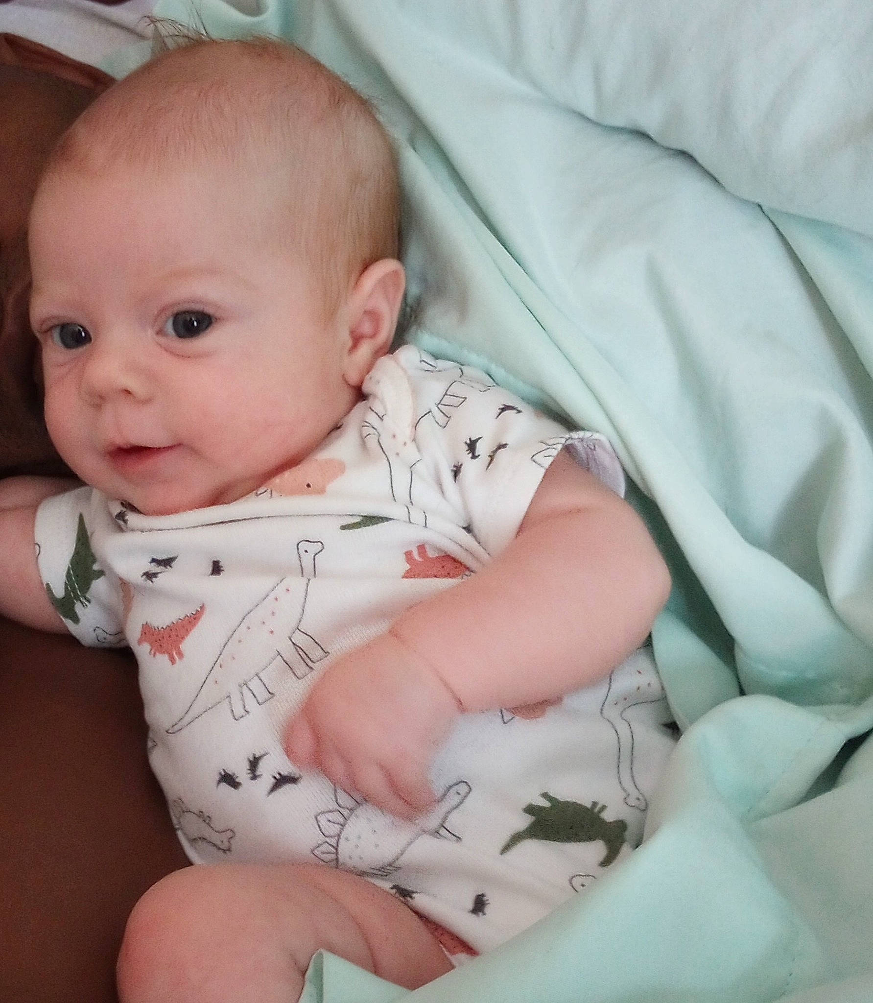 Flora joined the competition — help win amazing prizes! baby, baby_toddler_clothing, cheek, child, chin, collar, comfort, elbow, eye, face, iris, linens, lip, pattern, person, sitting, skin, sleeve, stomach, textile