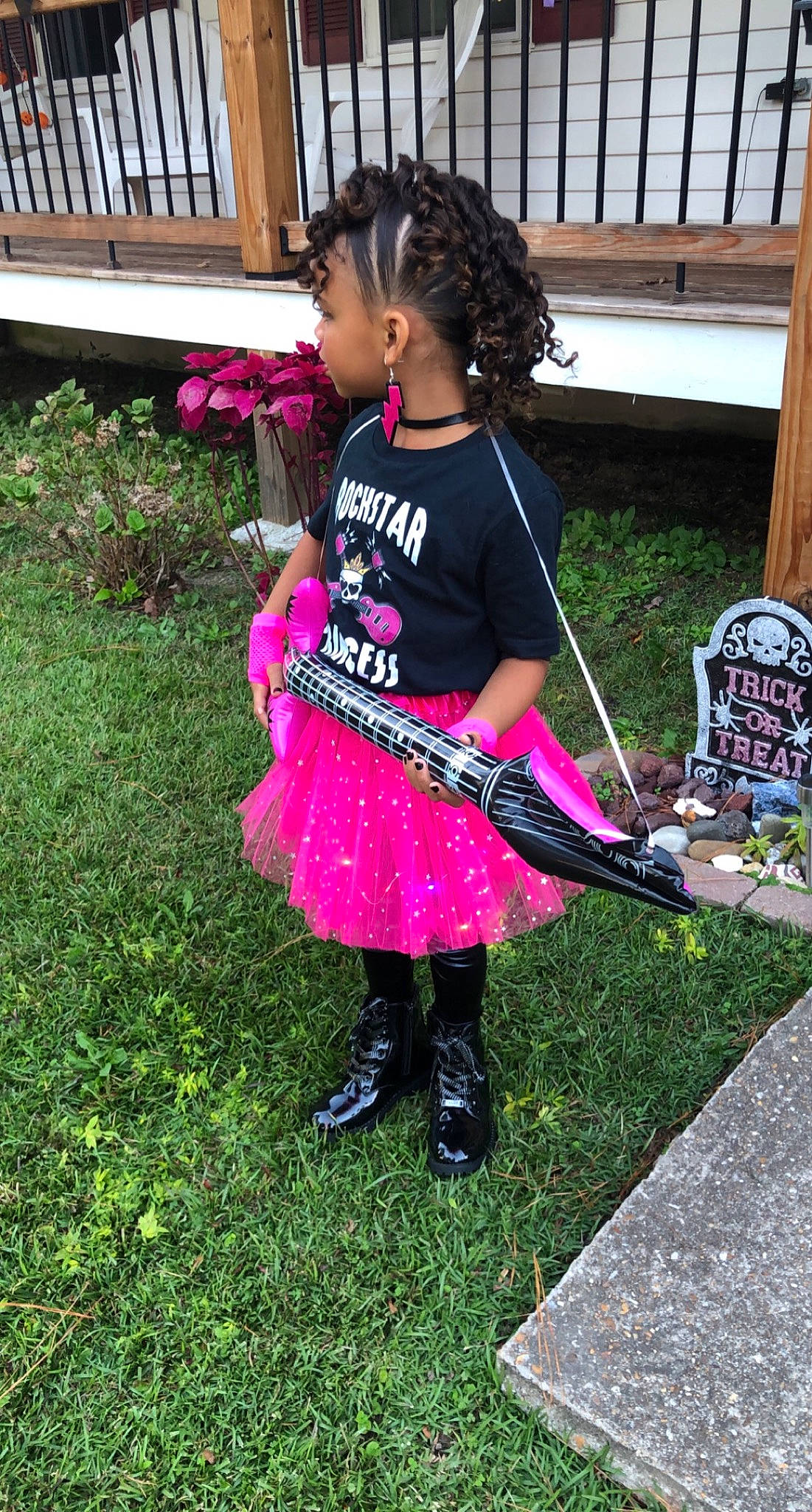 Delilah is registered to the contest to win money with this photo: baby_toddler_clothing, child, costume, fashion_accessory, fun, grass, happy, human_leg, leggings, magenta, pattern, person, pink, plant, sandal, t_shirt, thigh, toddler, waist, walking