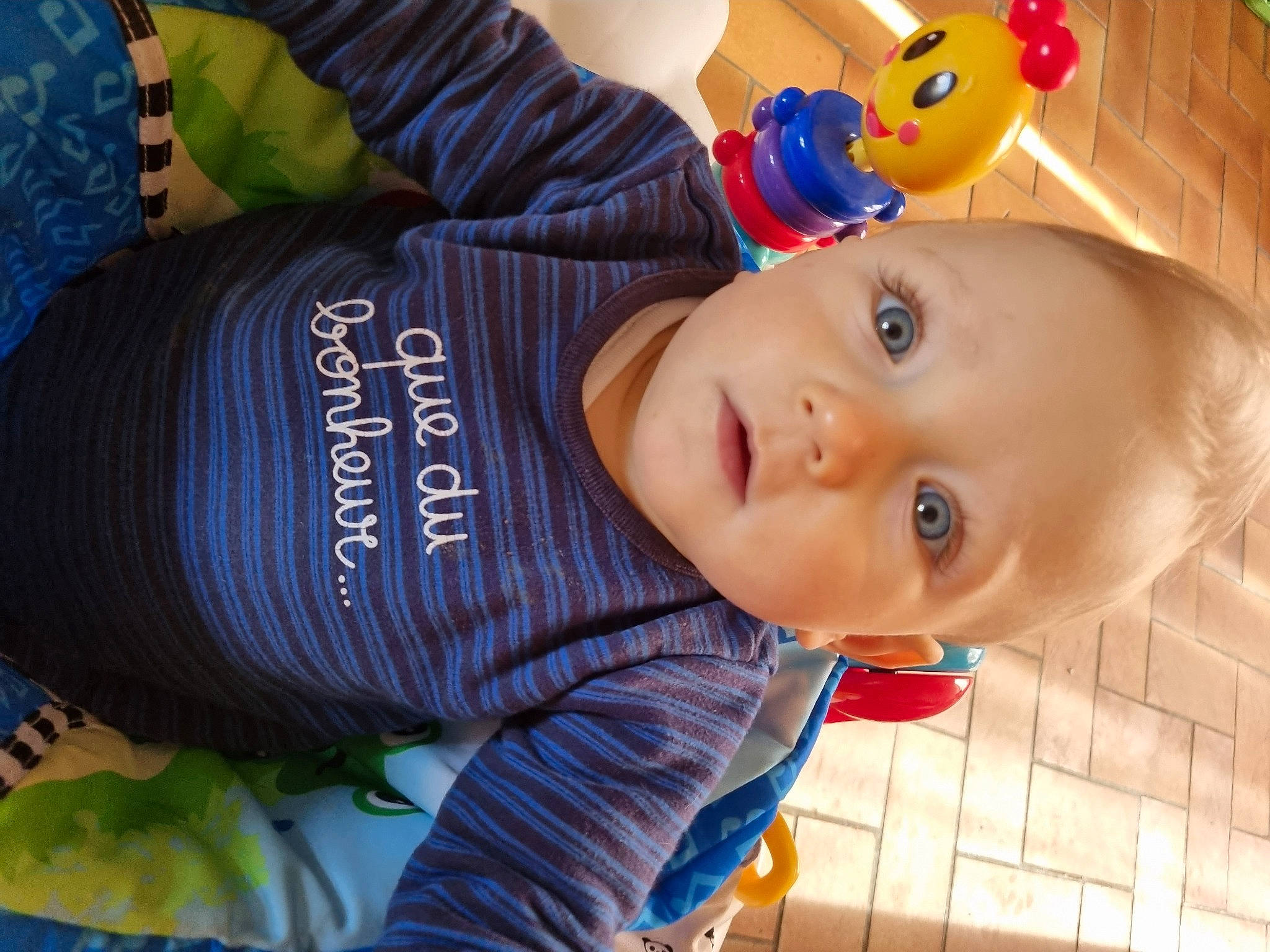 Jonathan participe au concours pour gagner de l'argent avec cette photo : baby, baby_products, baby_toddler_clothing, cheek, child, comfort, electric_blue, fun, happy, headgear, leisure, mammal, nose, pattern, person, product, sitting, sleeve, smile, toddler