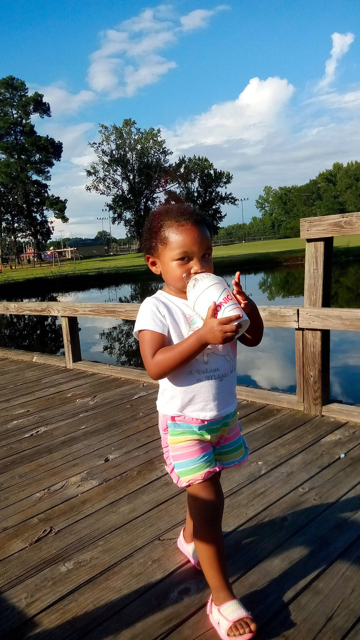 Mallori joined the competition — help win amazing prizes! baby, child, cloud, fence, fun, grass, happy, leisure, people_in_nature, person, plant, recreation, shorts, sky, summer, thigh, toddler, travel, tree, water