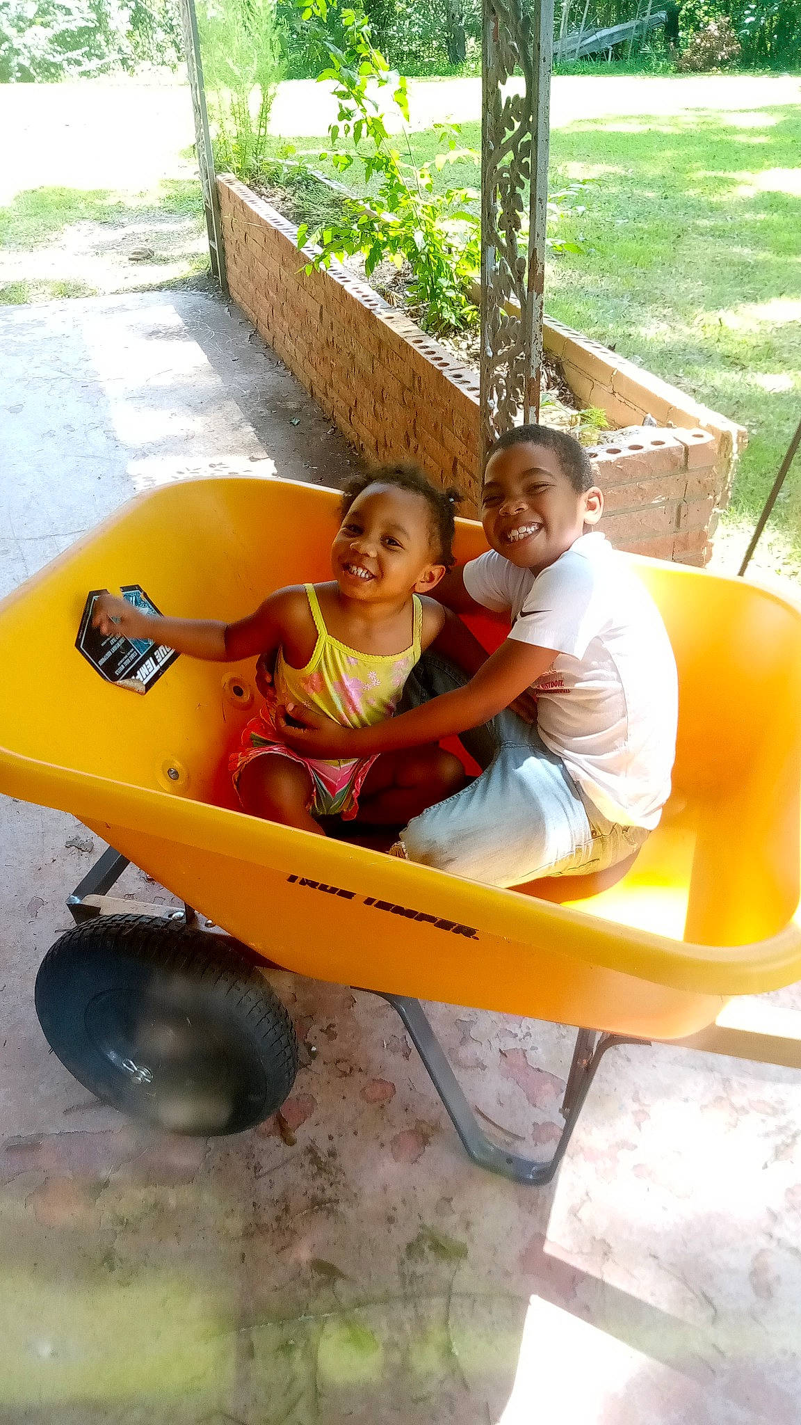 Mallori joined the competition — help win amazing prizes! comfort, fun, grass, happy, joy, leisure, outdoor_furniture, person, plant, play, recreation, sharing, shorts, sitting, smile, soil, table, tire, toddler, travel