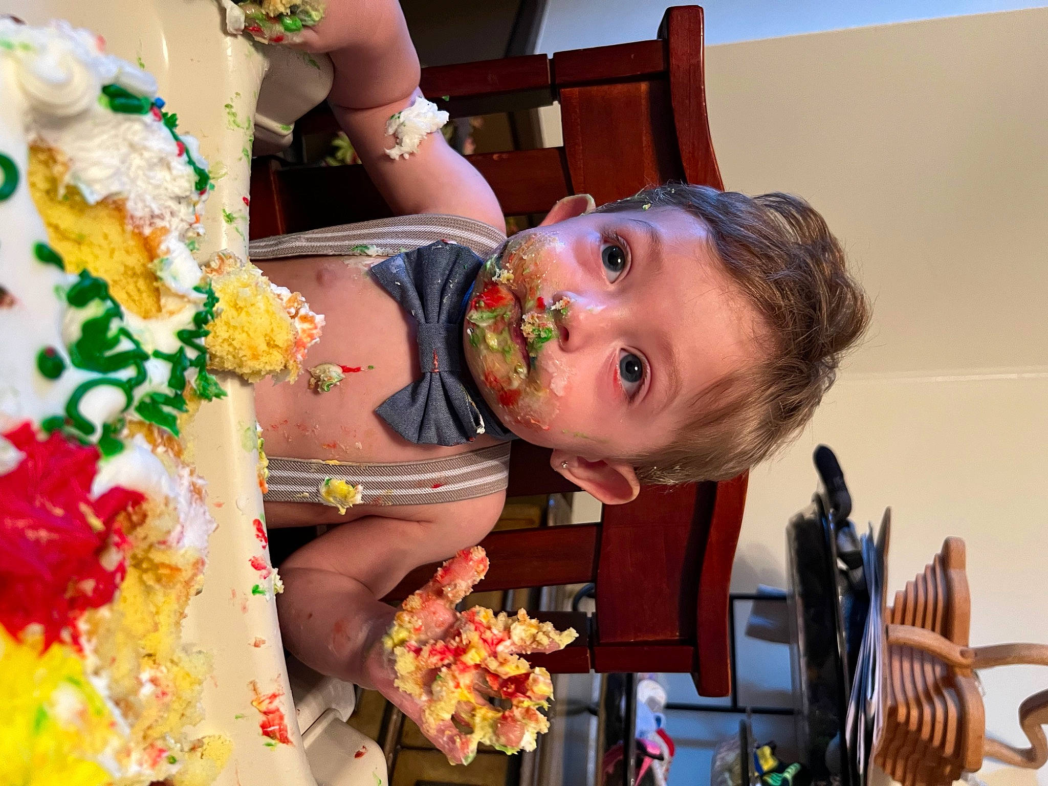 Axel joined the competition — help win amazing prizes! baby, chair, child, event, facial_expression, floral_design, floristry, flower, flower_arranging, food, fun, happy, jewellery, lei, orange, peach, person, plant, smile, toddler