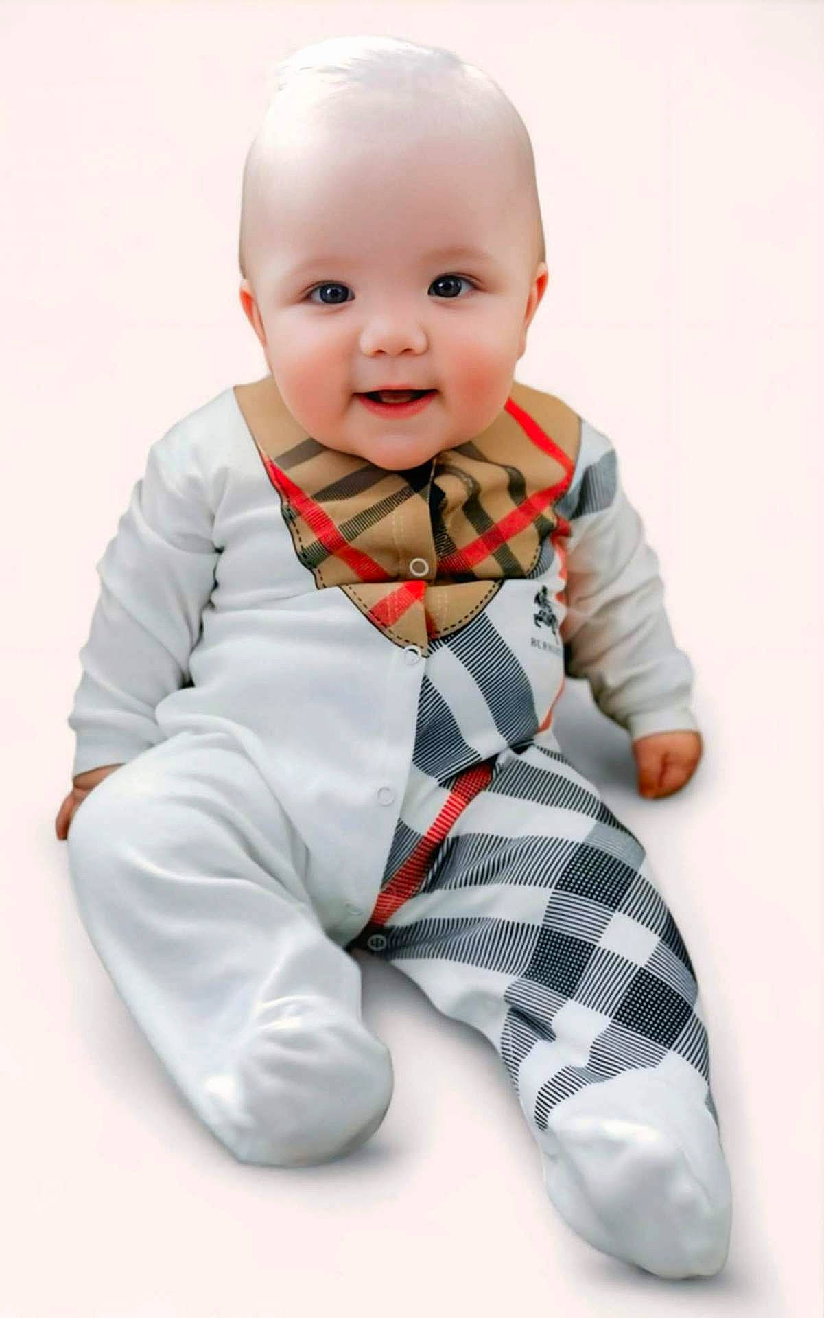Michael joined the competition — help win amazing prizes! adorable, baby, cheeks, child, chubby, clothing, cute, eyes, face, footed_pajamas, happy, indoor, infant, onesie, plaid, portrait, sitting, smiling, soft_background, young