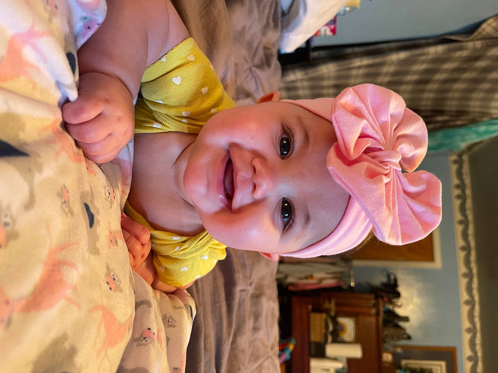 Reece is registered to the contest to win money with this photo: baby, baby_toddler_clothing, cheek, child, event, facial_expression, fun, happy, hat, headwear, iris, joy, laugh, leisure, mouth, nose, person, pink, skin, smile