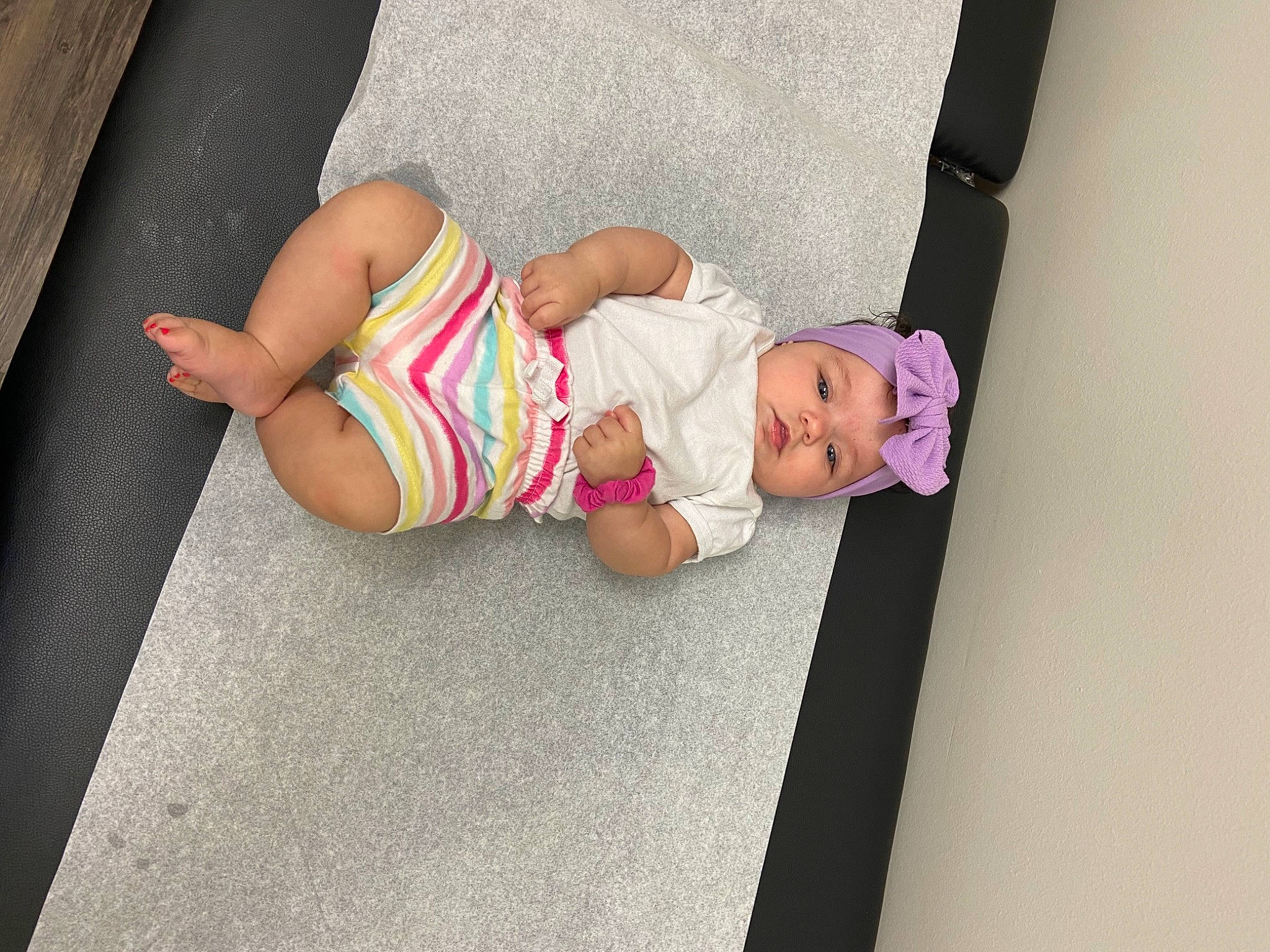 Kenley is registered to the contest to win money with this photo: baby, baby_products, baby_toddler_clothing, barefoot, child, comfort, flooring, foot, fun, headwear, human_leg, knee, leisure, magenta, person, physical_fitness, sandal, sitting, sock, thigh