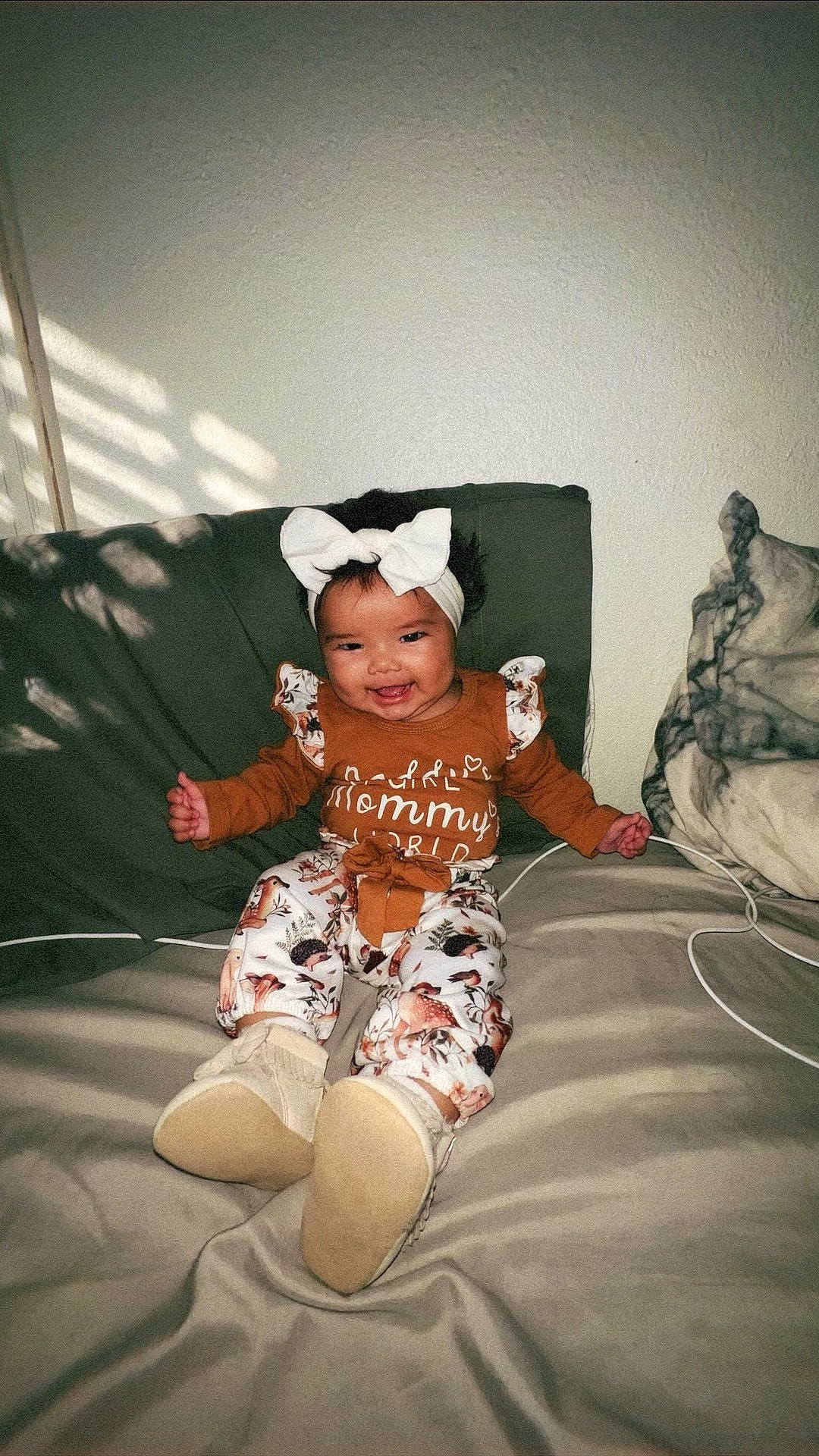 Adalynn joined the competition — help win amazing prizes! baby, baby_toddler_clothing, child, comfort, couch, event, fashion_design, flash_photography, flesh, fun, happy, hat, headwear, person, room, sitting, sleeve, smile, t_shirt, toddler