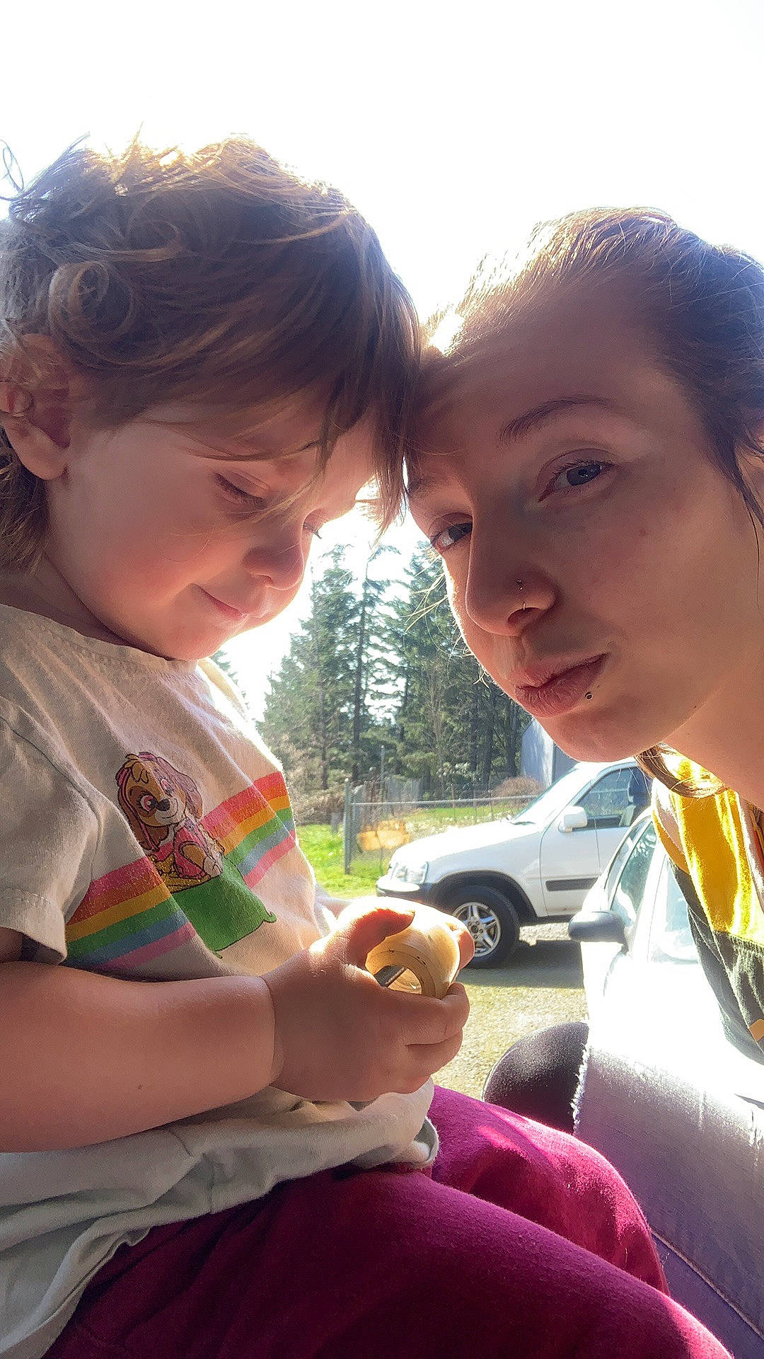 Laura joined the competition — help win amazing prizes! face, facial_expression, fun, gesture, grass, hand, happy, human, mammal, morning, mouth, organ, person, plant, sharing, skin, sunlight, tire, tree, vertebrate