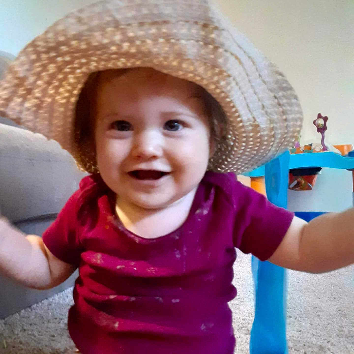 Kiora joined the competition — help win amazing prizes! architecture, baby, building, cap, chair, clothing, costume, face, furniture, happy, hat, head, indoors, livingroom, person, photoframe, photography, portrait, sitting, sunhat