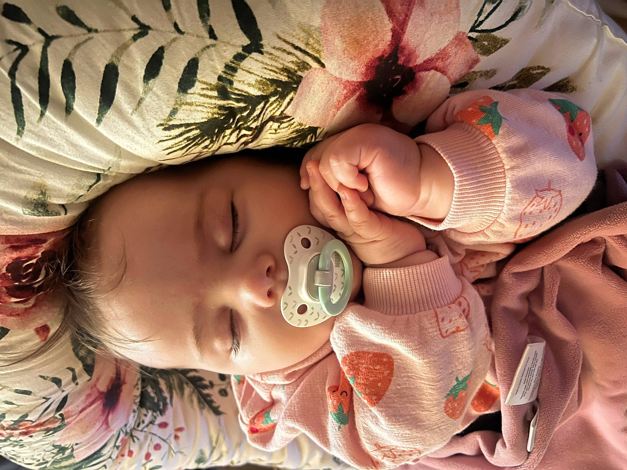 Ivey is registered to the contest to win money with this photo: arm, baby, cheek, child, close_up, cool, dress, eye, eyelash, hair, head, headgear, human_body, iris, mouth, neck, nose, person, pink, skin