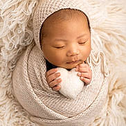 Sangsehang joined the competition — help win amazing prizes! newborn, baby, infant, wrapped, knitted, blanket, bonnet, heart, soft, cozy, sleeping, peaceful, hands, cute, portrait, closeup, warm, fuzzy, plush, resting