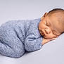 Sangsehang joined the competition — help win amazing prizes! newborn, baby, sleeping, knitwear, blue, cozy, infant, portrait, peaceful, cute, soft_texture, resting, child, small, hands, head, face, closed_eyes, studio, blanket