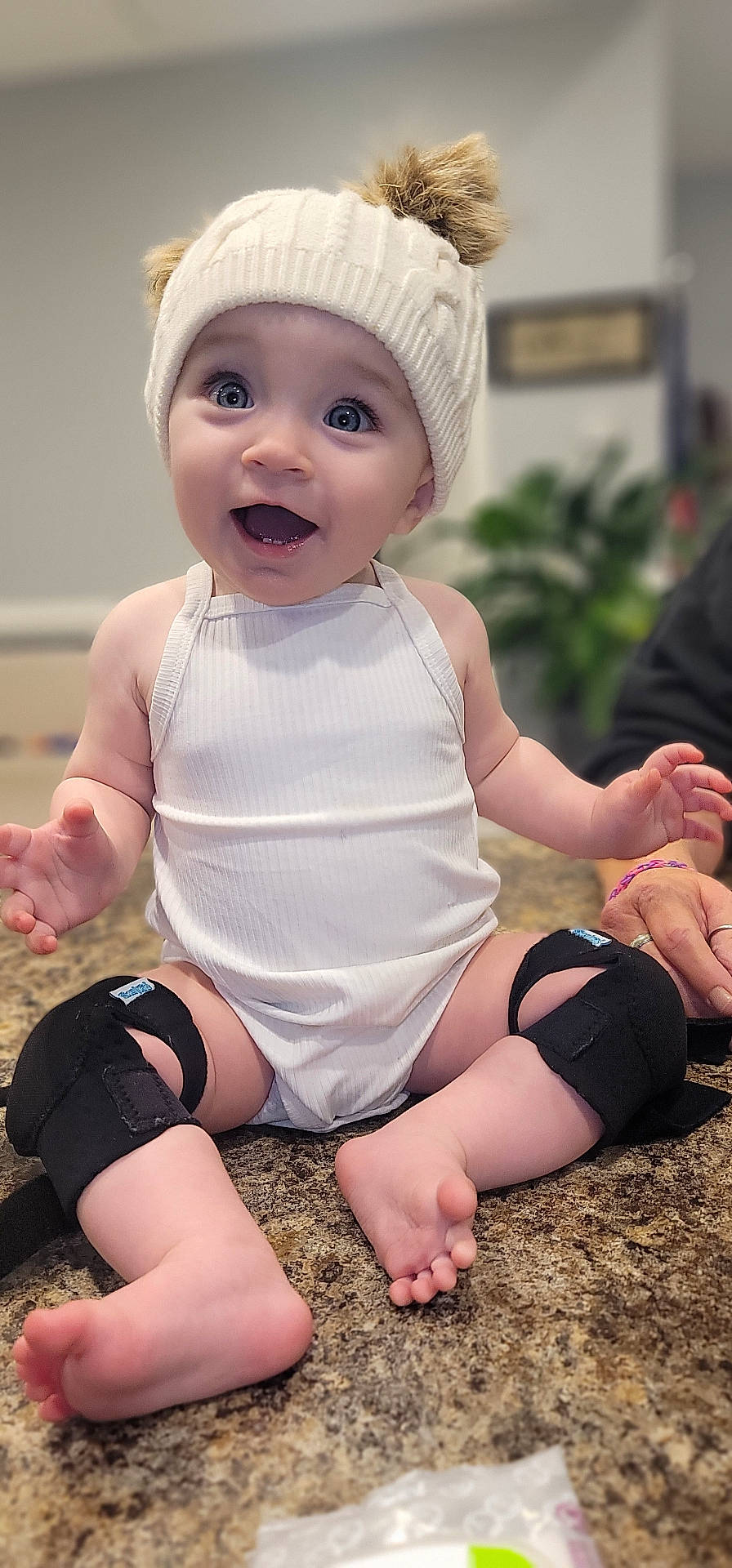 Abigail joined the competition — help win amazing prizes! accessories, baby, barefoot, bodypart, bonnet, bracelet, cap, clothing, face, finger, hand, hat, head, jewelry, person, photography, portrait, ring, shorts, sitting